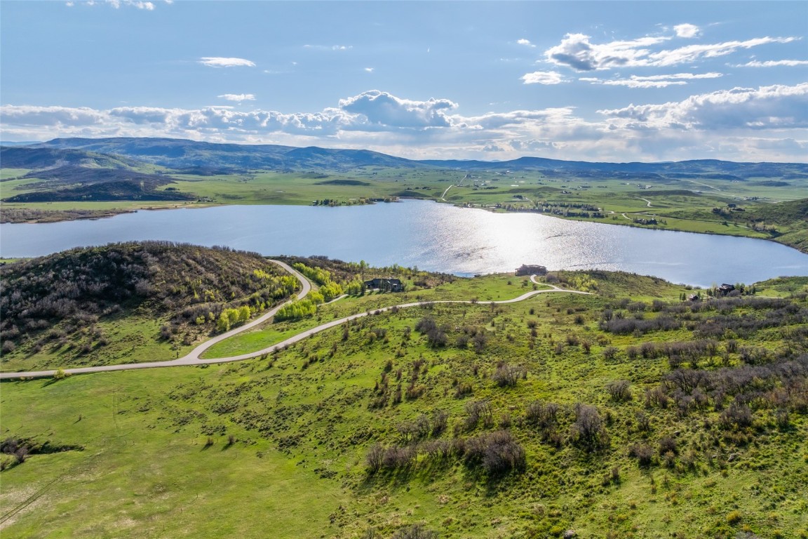 30105 Harrison Trail Steamboat Springs, CO 80487 - Photo 6 of 25 a view of a lake in the middle of a field