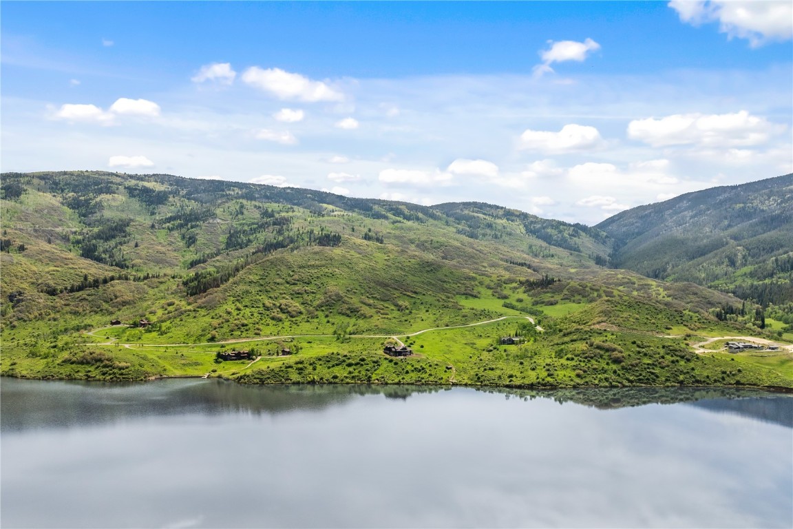 30105 Harrison Trail Steamboat Springs, CO 80487 - Photo 9 of 25 a view of a lake with a mountain