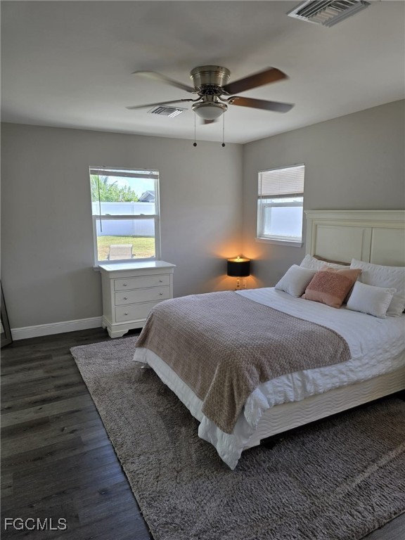 112 Rowland Road Lehigh Acres, FL 33936 - Photo 18 of 31 a bedroom with a bed and window