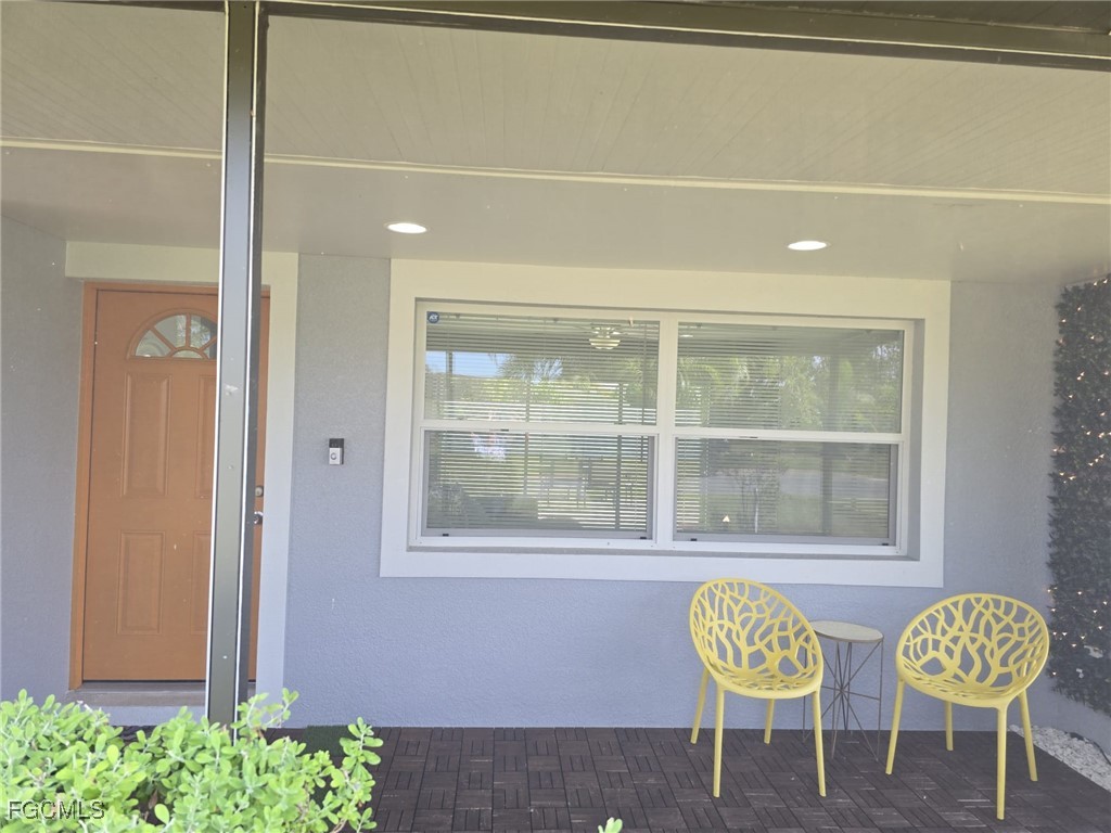 112 Rowland Road Lehigh Acres, FL 33936 - Photo 2 of 31 a view of dining room and chairs in a room