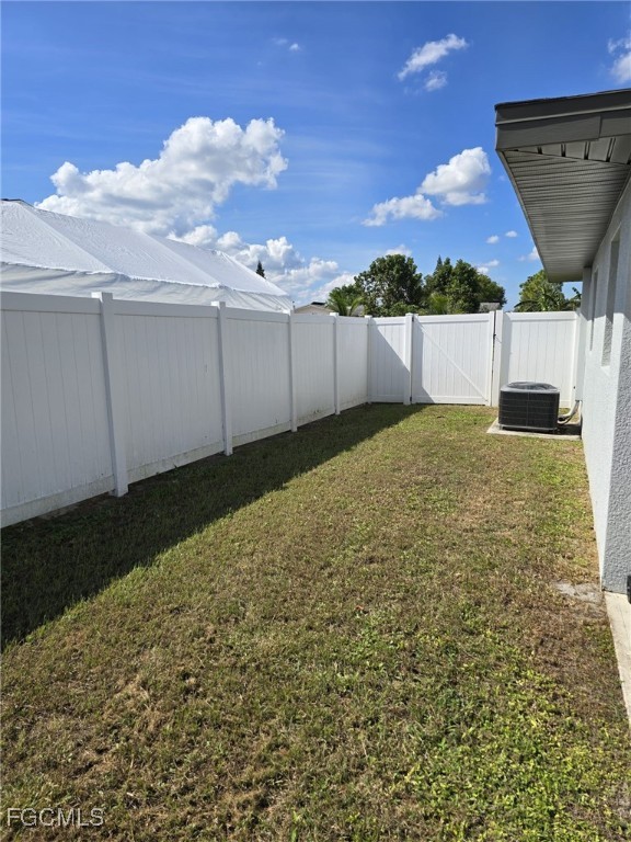 112 Rowland Road Lehigh Acres, FL 33936 - Photo 29 of 31 a view of a backyard