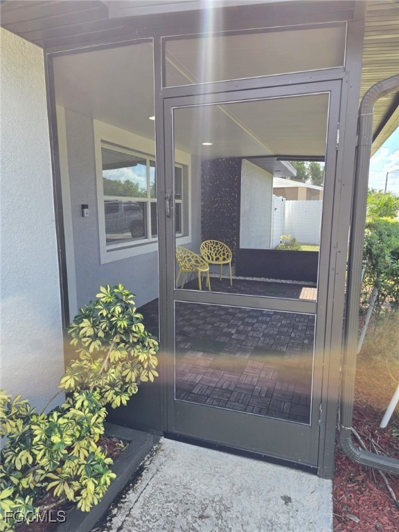 112 Rowland Road Lehigh Acres, FL 33936 - Photo 3 of 31 a living room with garden