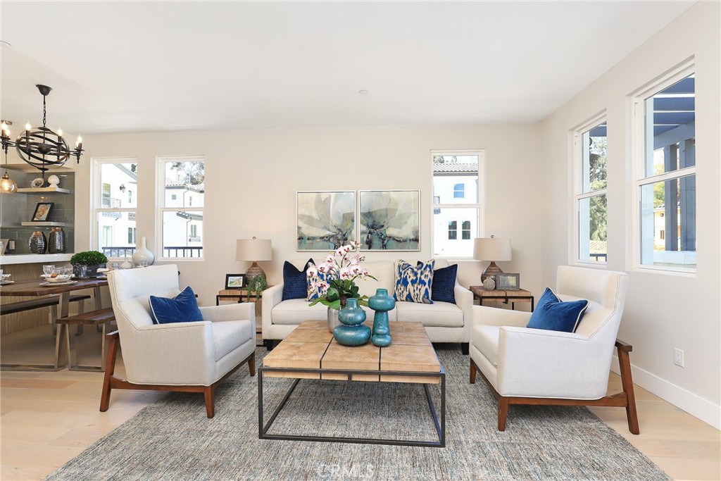 24 Spyglass Avenue Phillips Ranch, CA 91766 - Photo 11 of 63 a living room with furniture and a large window