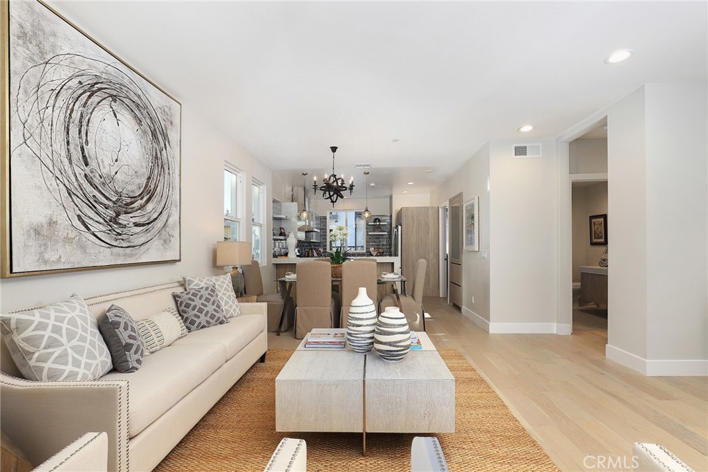 24 Spyglass Avenue Phillips Ranch, CA 91766 - Photo 33 of 63 a living room with furniture and a rug