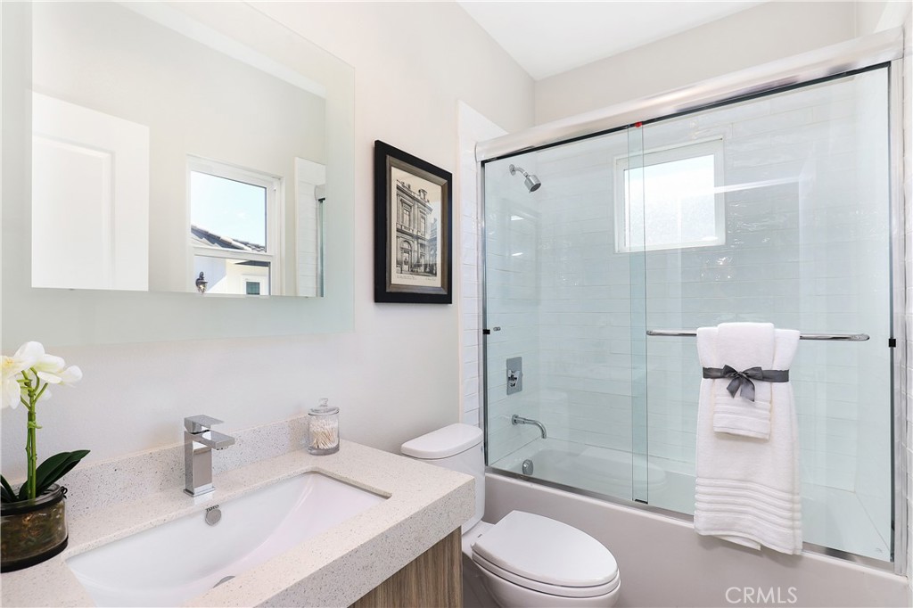 24 Spyglass Avenue Phillips Ranch, CA 91766 - Photo 45 of 63 a bathroom with a sink toilet and shower