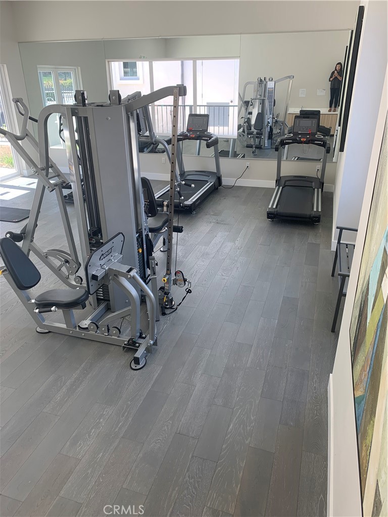 24 Spyglass Avenue Phillips Ranch, CA 91766 - Photo 62 of 63 a view of a room with gym equipment