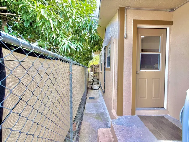 a view of a back yard of the house