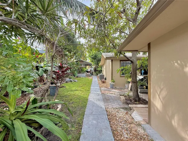 a view of a porch with wooden floor