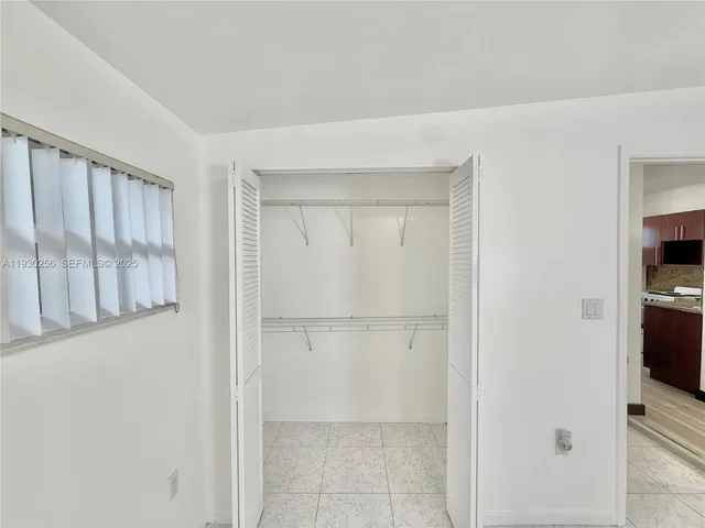 an empty room with a window