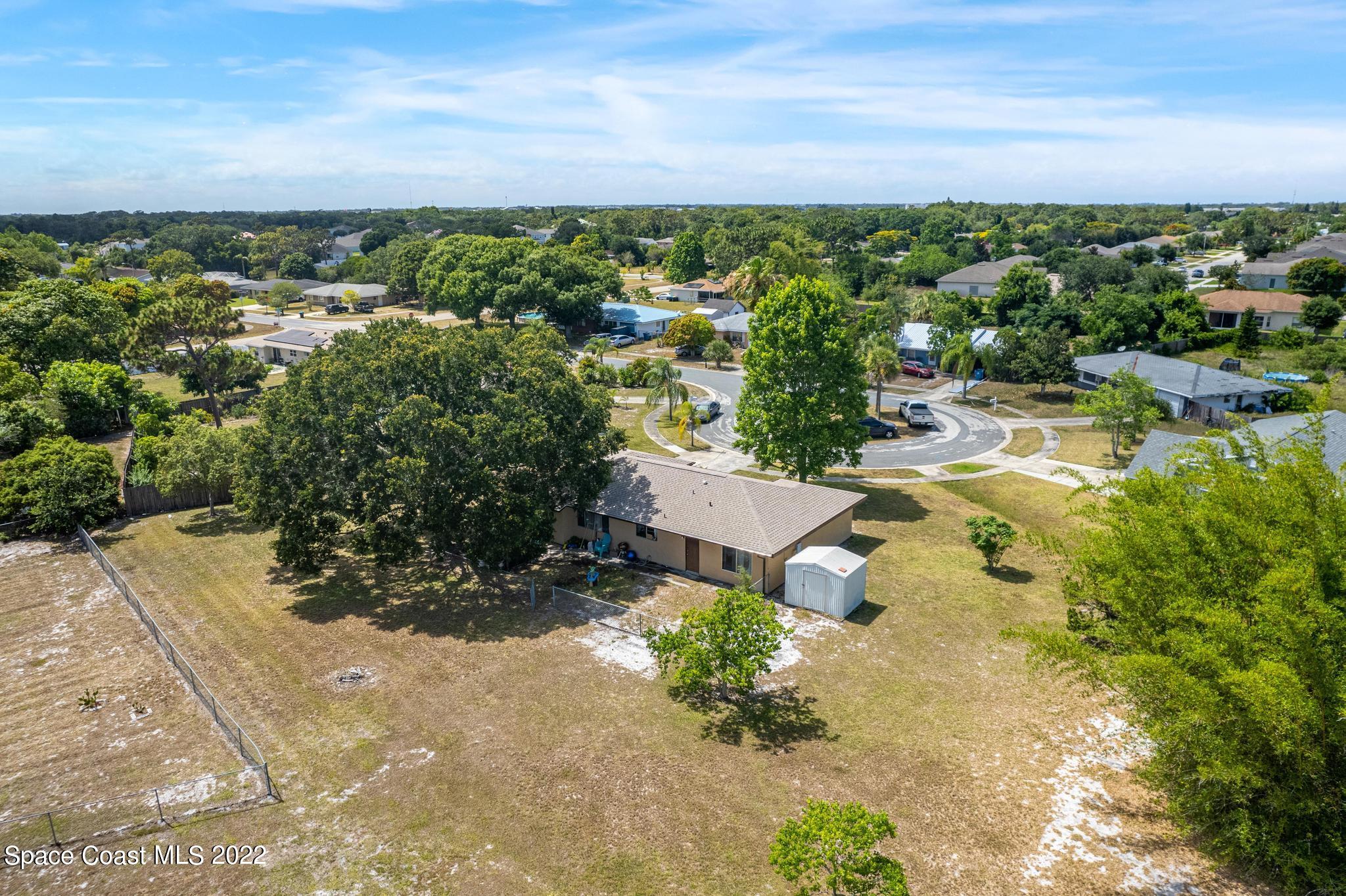 1148 Newbern Street Northeast Palm Bay, FL 32905 - Photo 32 of 38 a view of a city with ocean view