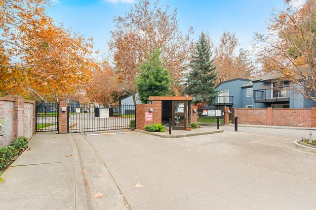 a view of a city street with a building