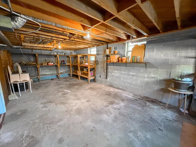 a view of a room with wooden racks