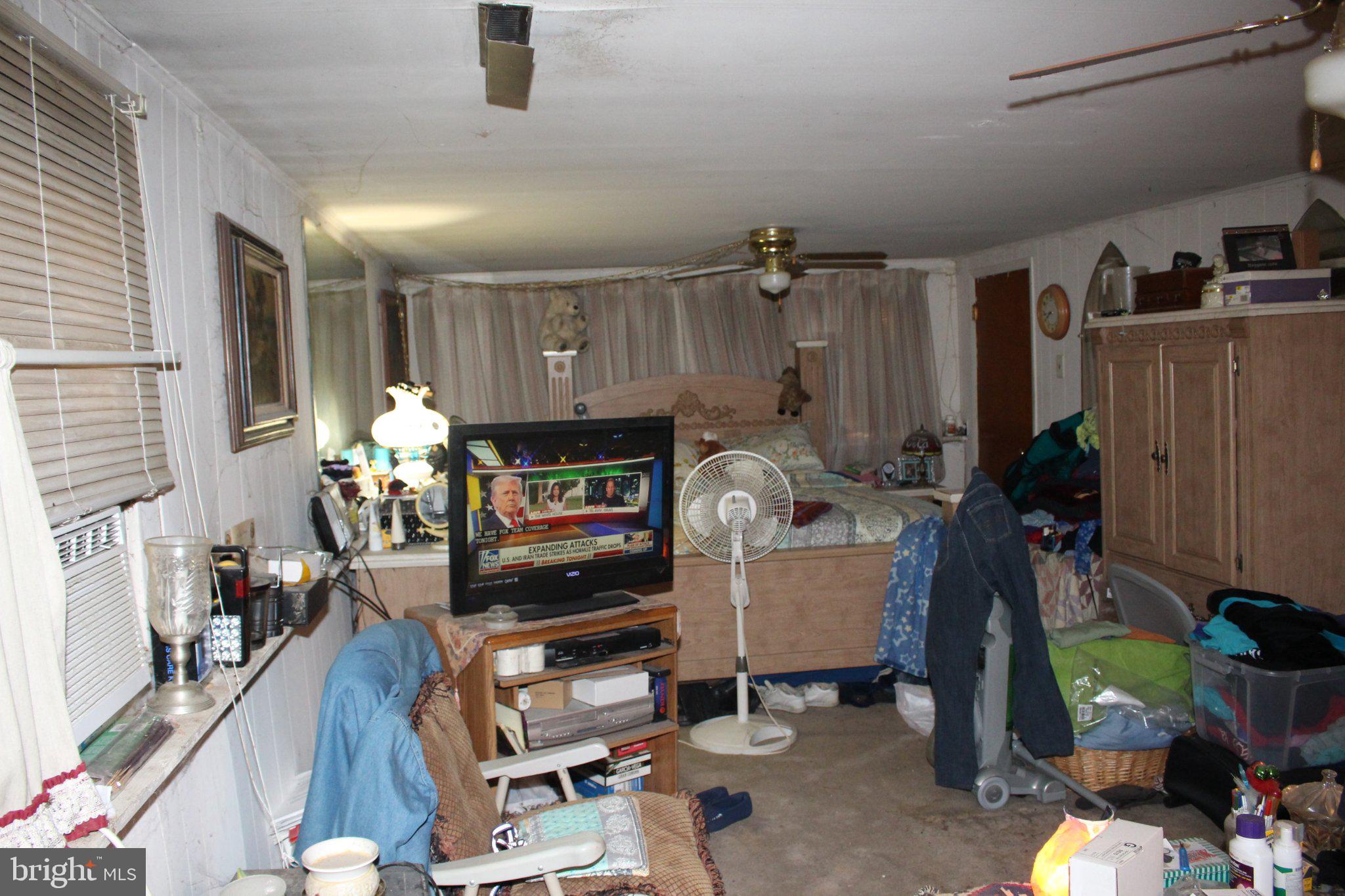 222 Ogden Sta Road Deptford, NJ 08090 - Photo 21 of 37 Cluttered space with cozy charm.