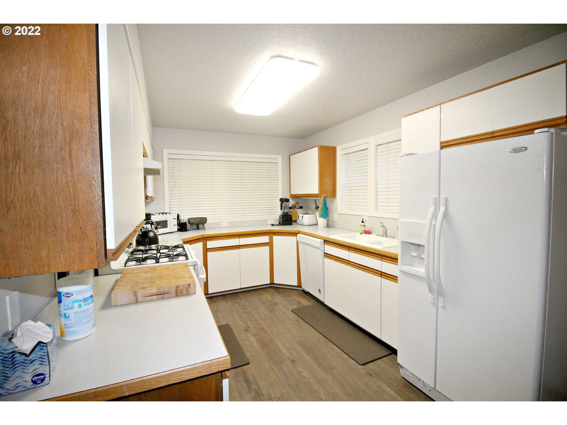 71403 Fishhawk Road Birkenfeld, OR 97016 - Photo 12 of 31 a kitchen with stainless steel appliances granite countertop a sink refrigerator and cabinets