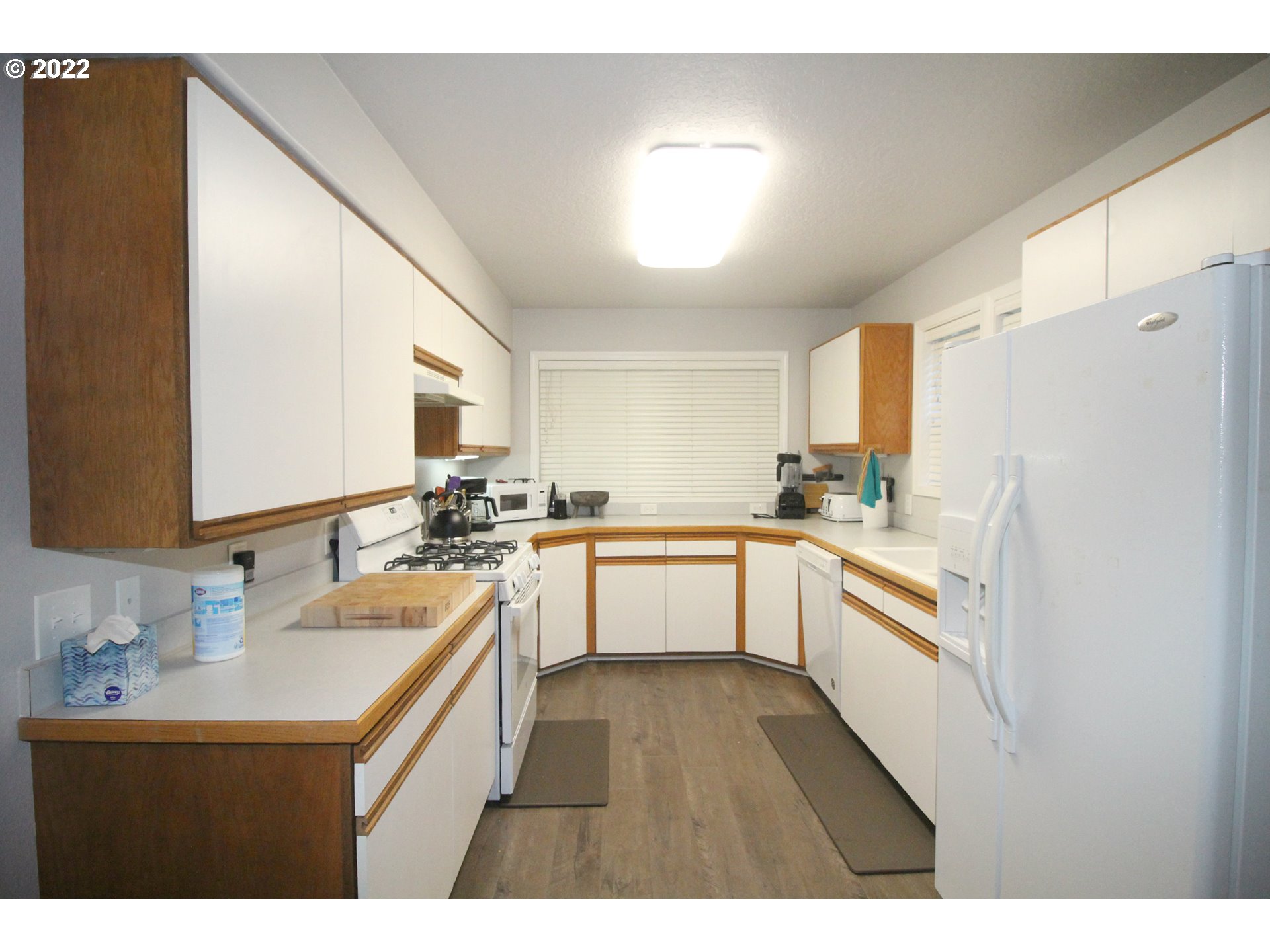 71403 Fishhawk Road Birkenfeld, OR 97016 - Photo 13 of 31 a kitchen with a sink appliances cabinets and a counter top space