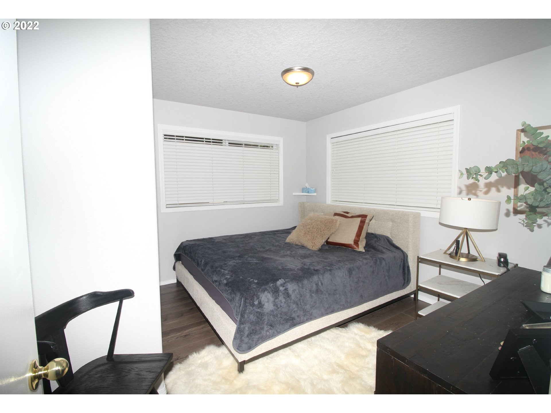 71403 Fishhawk Road Birkenfeld, OR 97016 - Photo 15 of 31 a bedroom with a bed and window