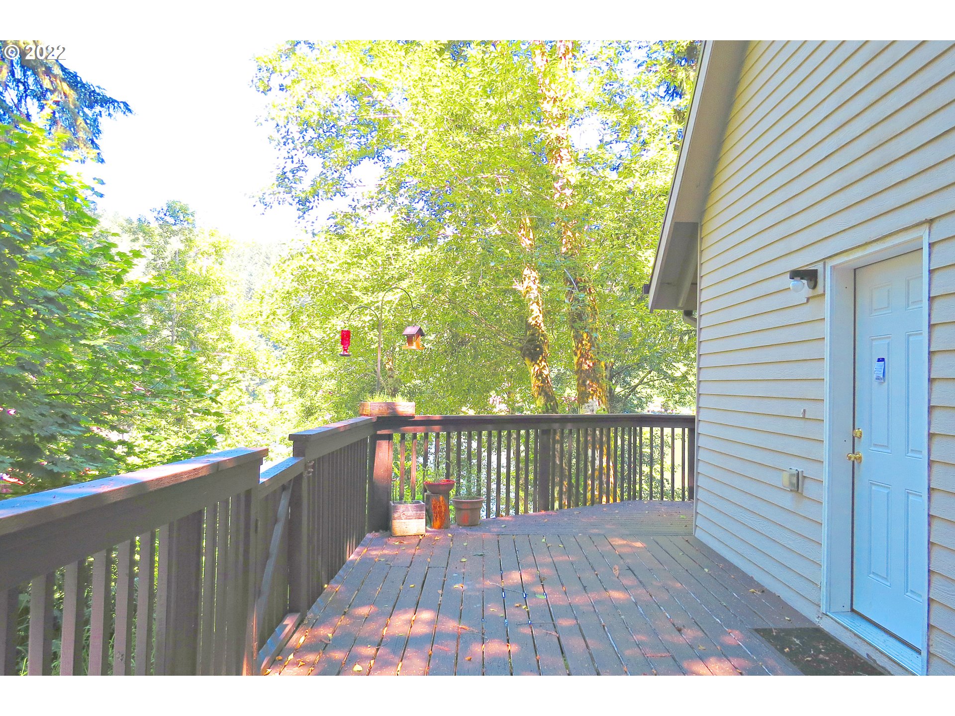 71403 Fishhawk Road Birkenfeld, OR 97016 - Photo 3 of 31 a view of balcony with wooden floor