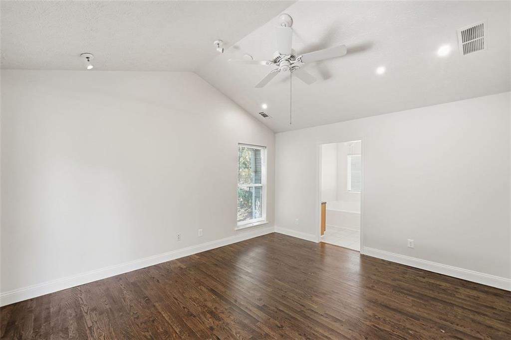 1512 Upper Sassafras Road Jasper, GA 30143 - Photo 21 of 41 wooden floor in an empty room with a window