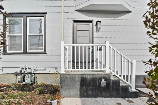 a view of a balcony with chair