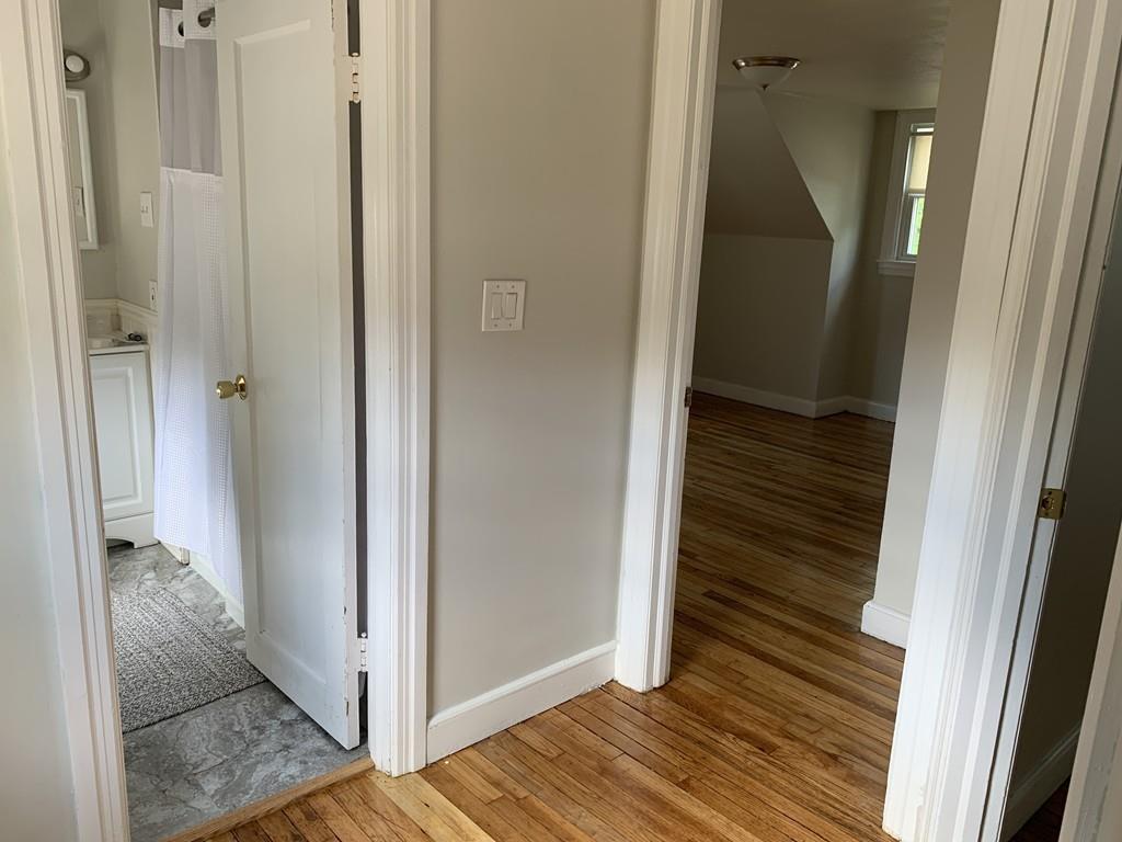 86 Russell Street Springfield, MA 01104 - Photo 12 of 23 a view of a bathroom from the hallway