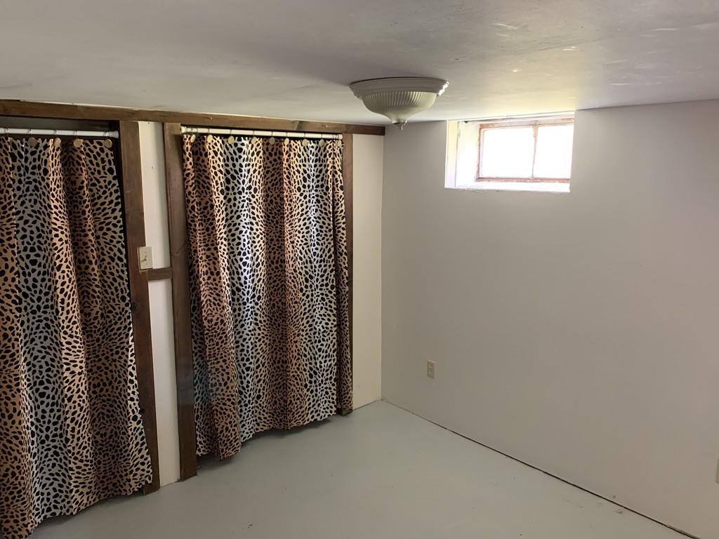 86 Russell Street Springfield, MA 01104 - Photo 18 of 23 a view of a hallway with windows