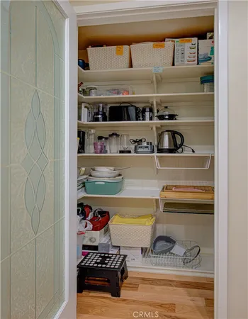 a kitchen with a sink stove and refrigerator