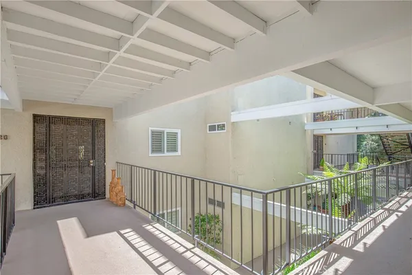 a bedroom with a bed and a closet