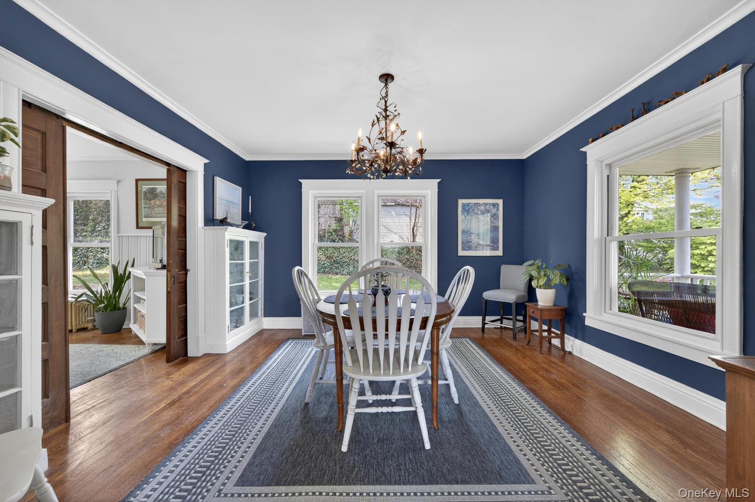 17 Riggs Place Locust Valley, NY 11560 - Photo 10 of 25 Formal Dining room with original pocket doors
