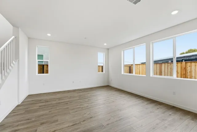 a view of kitchen with wooden floor