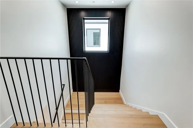 a utility room with sink dryer and washer