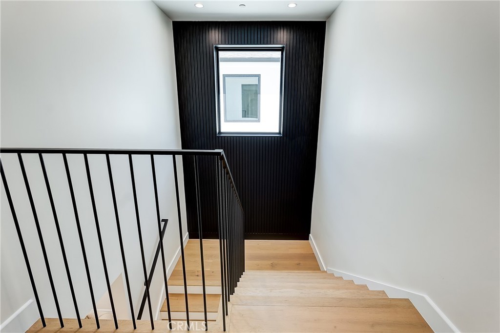 14929 Vose Street Van Nuys, CA 91405 - Photo 15 of 56 a view of balcony with wooden floor