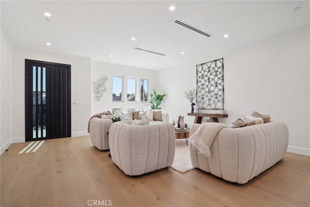 14929 Vose Street Van Nuys, CA 91405 - Photo 5 of 56 a living room with furniture and large window
