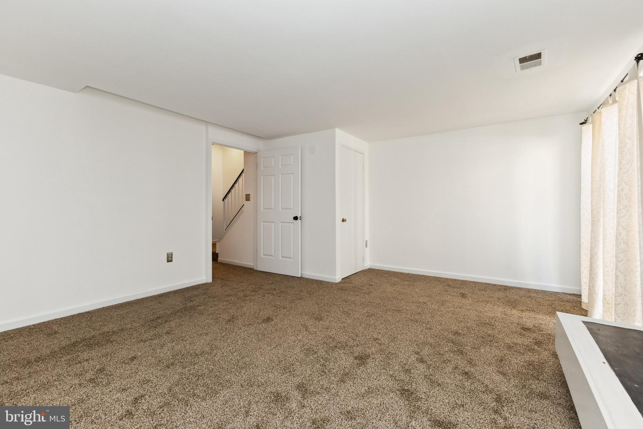 2480 Ridgehampton Court Reston, VA 20191 - Photo 21 of 25 an empty room with a natural light