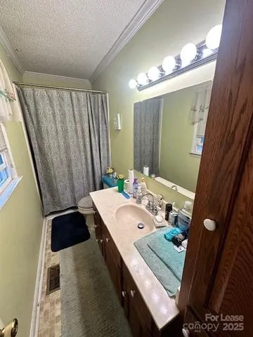 a bathroom with a sink a mirror and a shower