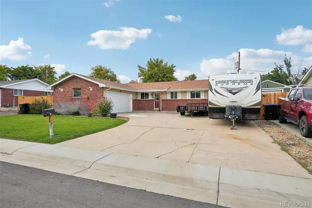 a view of house with outdoor space and street view