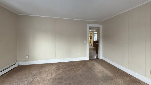 an empty room with an entryway