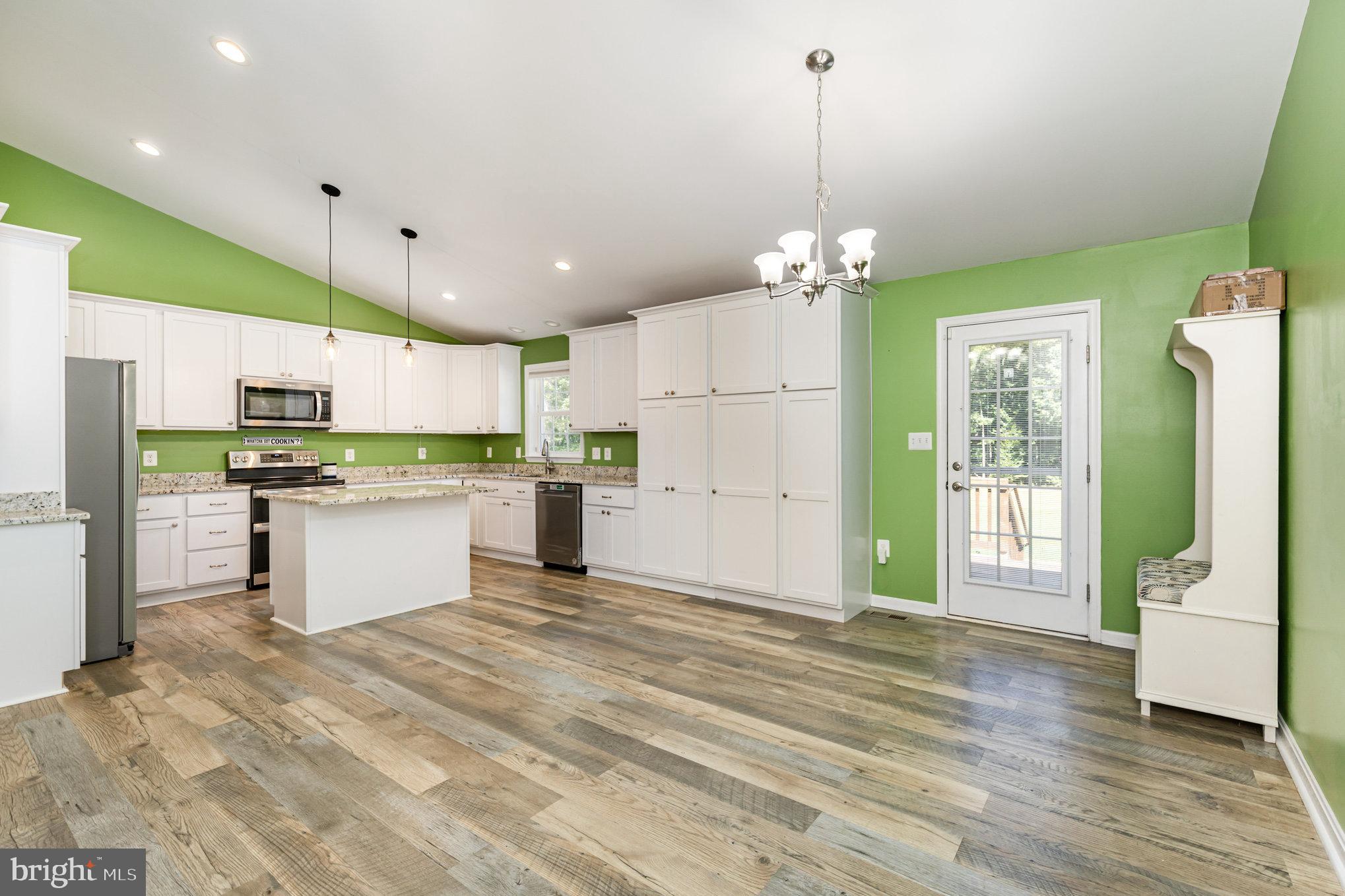 5428 Ridge Road Spotsylvania, VA 22551 - Photo 10 of 63 Bright and airy kitchen with modern flair.
