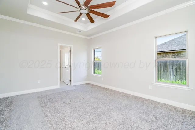 an empty room with fan