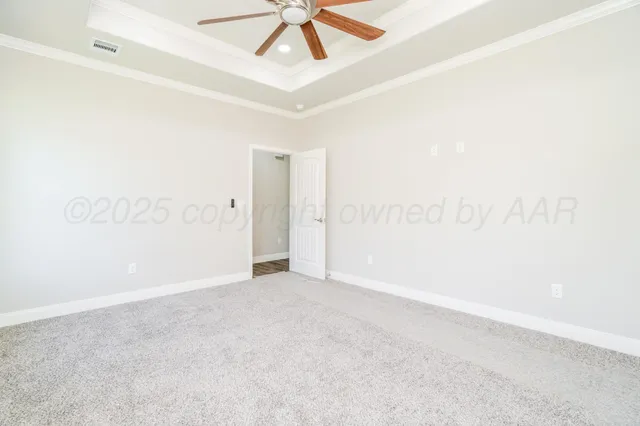 a bathroom with a granite countertop sink a mirror and a shower