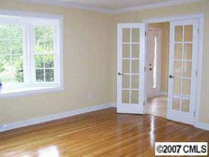 14540 Cabarrus Station Road Midland, NC 28107 - Photo 2 of 8 a view of an empty room with a window