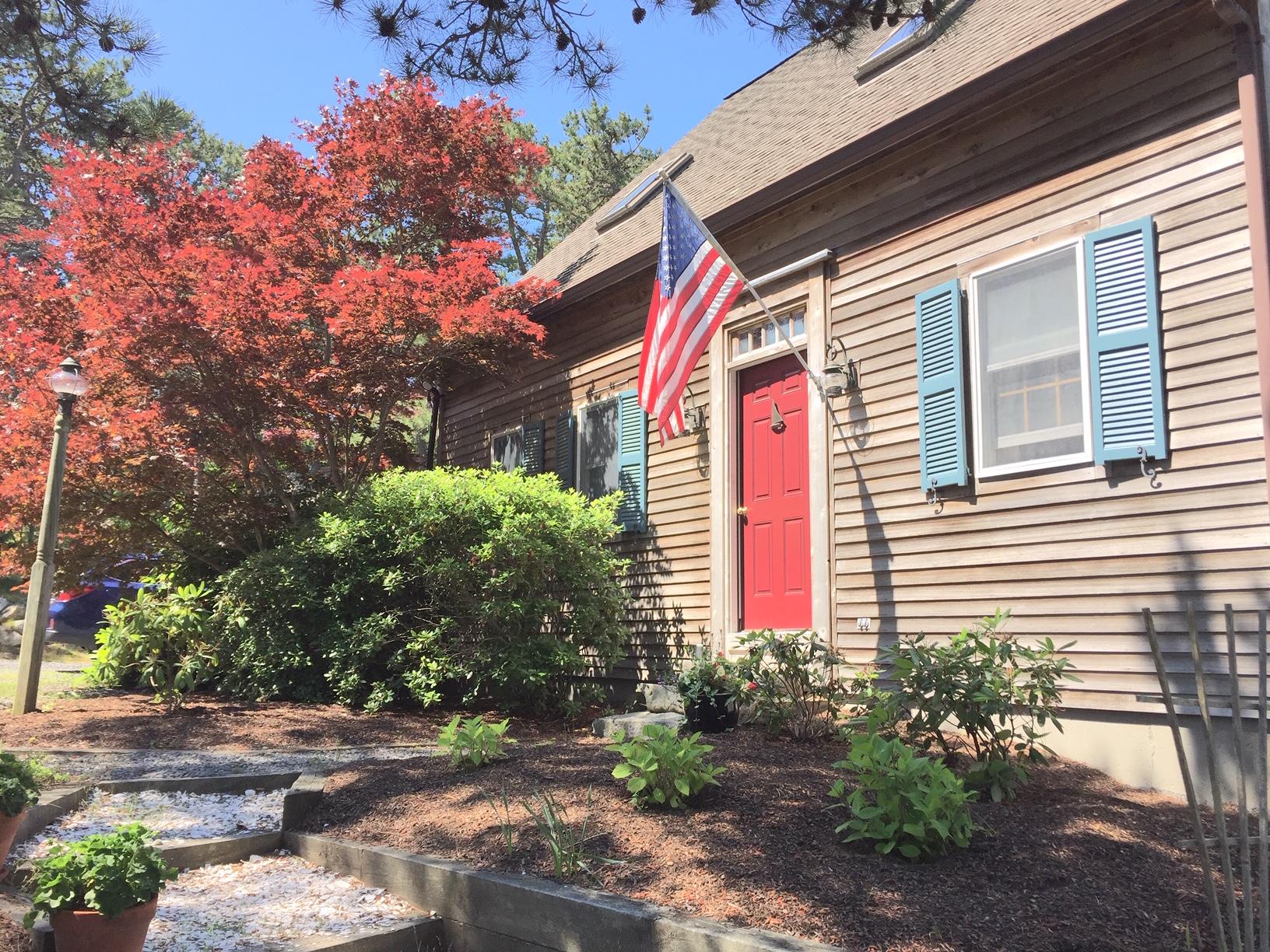 45 Marven Way Wellfleet, MA 02667 - Photo 26 of 37 a front view of a house with plants