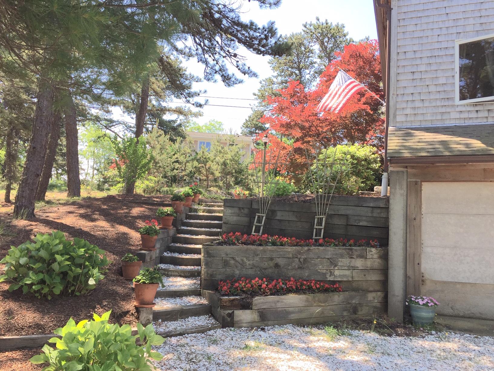 45 Marven Way Wellfleet, MA 02667 - Photo 29 of 37 a view of a pathway with a fire pit