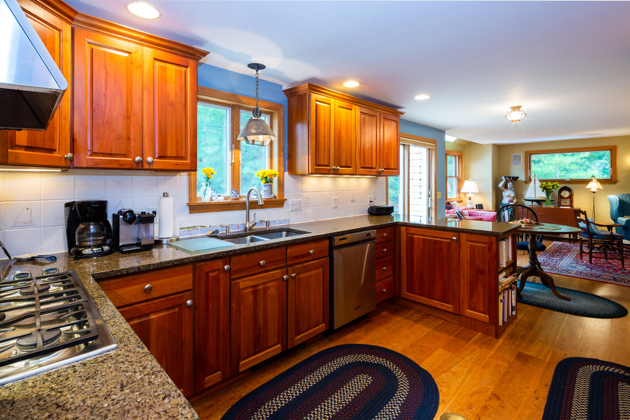 45 Marven Way Wellfleet, MA 02667 - Photo 3 of 37 a kitchen with stainless steel appliances granite countertop sink stove and cabinets
