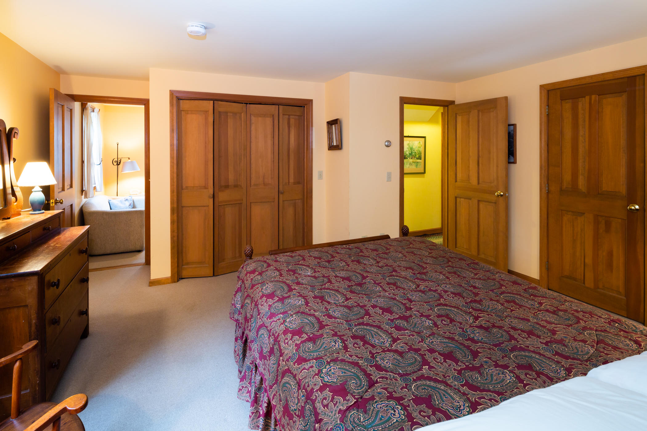 45 Marven Way Wellfleet, MA 02667 - Photo 34 of 37 a bedroom with a bed and wooden floor