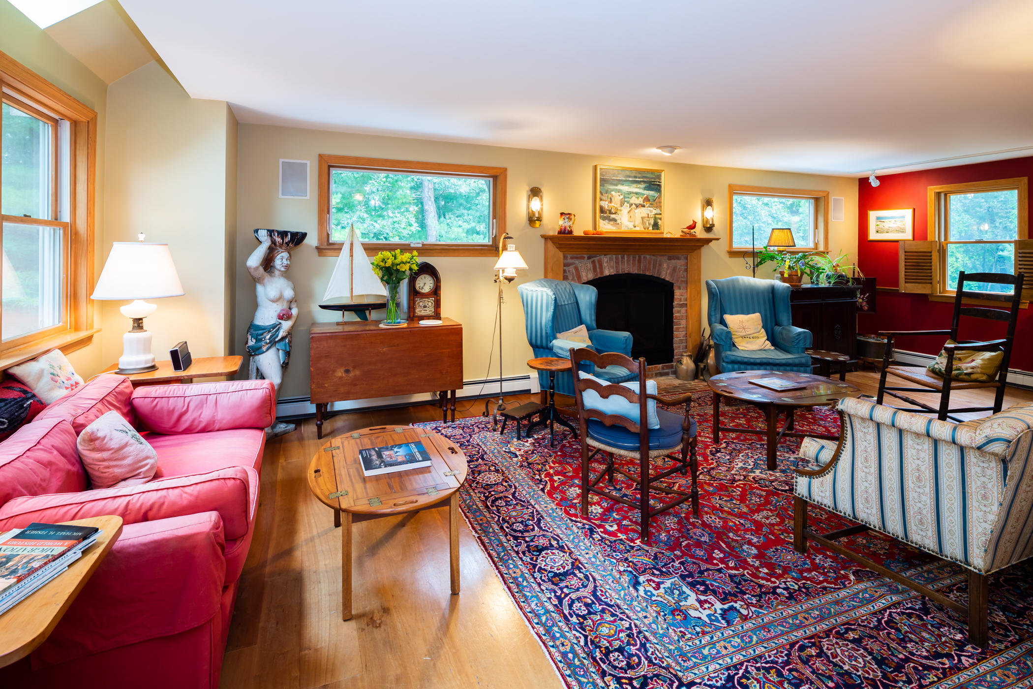 45 Marven Way Wellfleet, MA 02667 - Photo 4 of 37 a living room with furniture fireplace and a large window