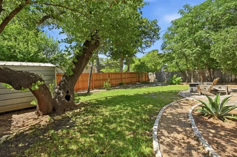 a view of a garden with patio