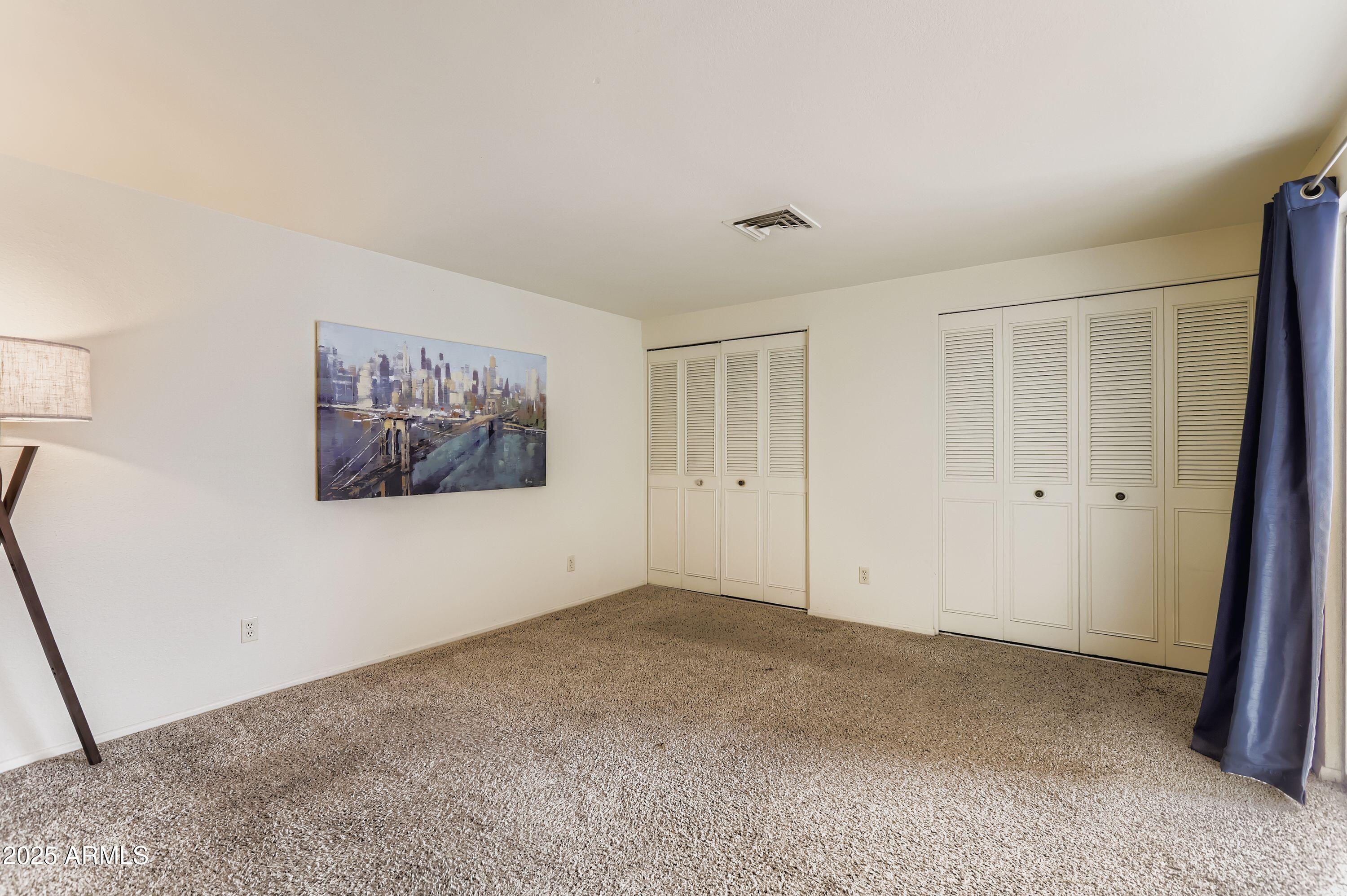 1619 West El Alba Way Chandler, AZ 85224 - Photo 14 of 26 a view of an empty room with a window