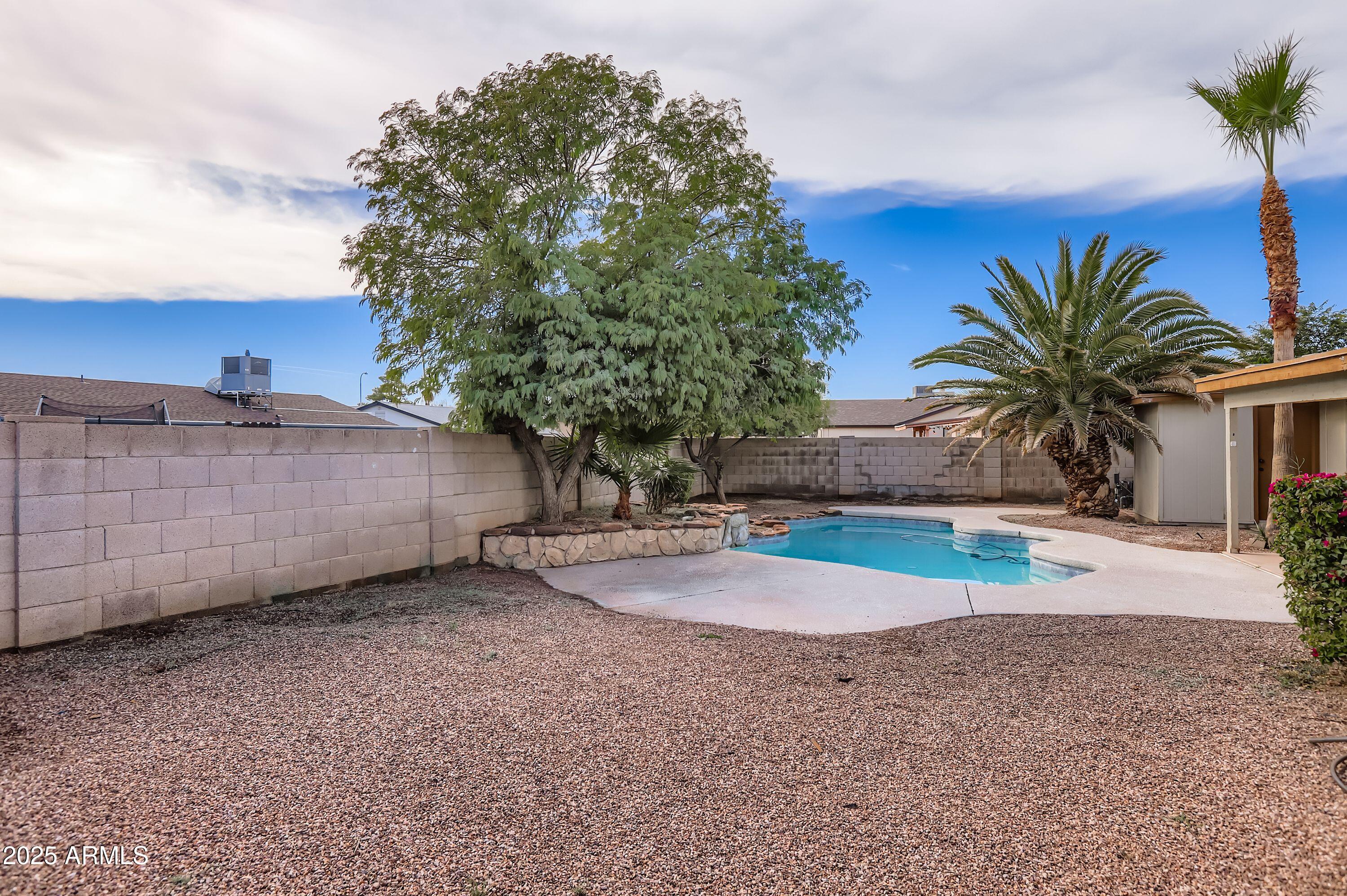 1619 West El Alba Way Chandler, AZ 85224 - Photo 25 of 26 a view of a backyard