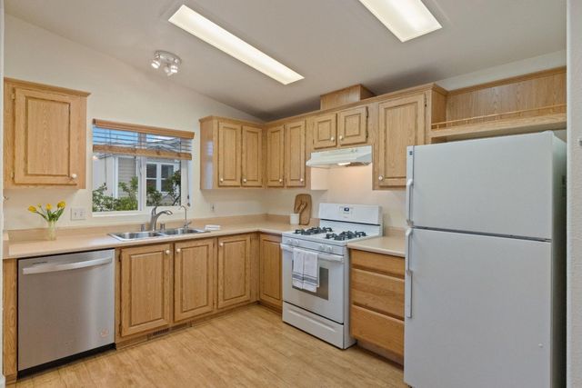 a view of a entryway with wooden floor