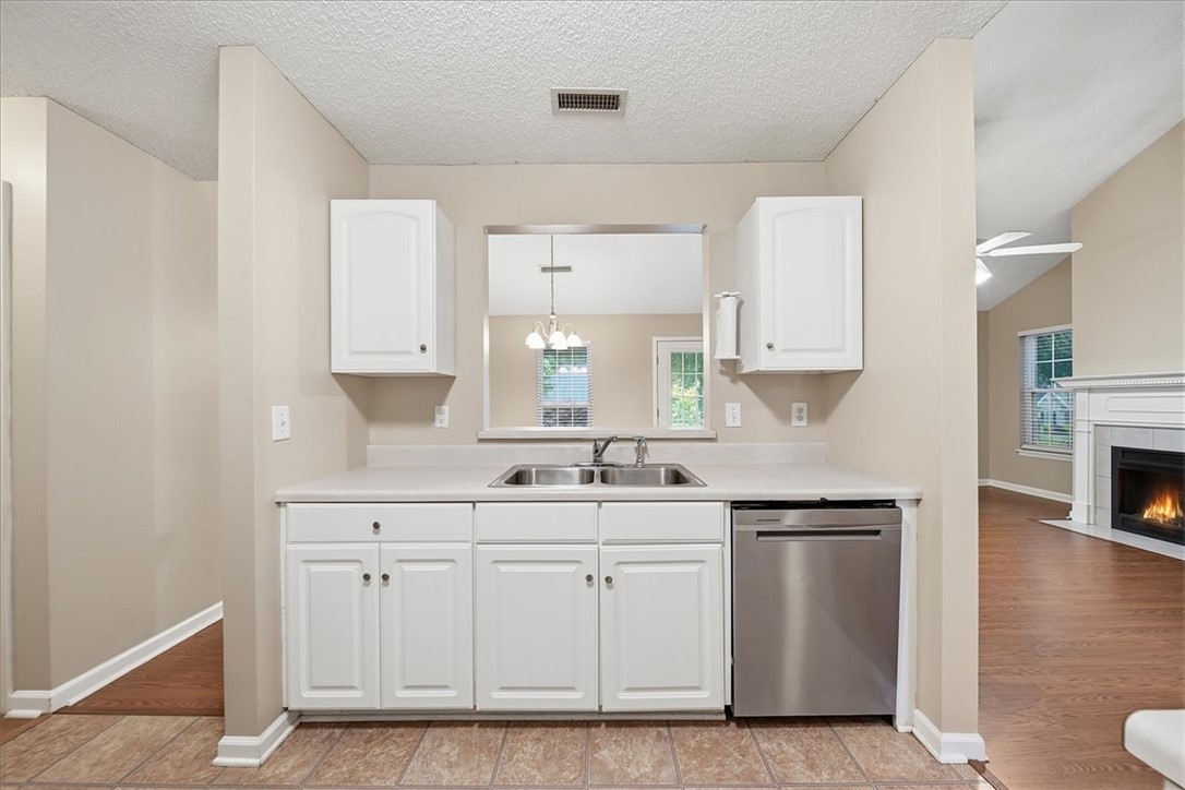 101 Grand Oak Circle Pendleton, SC 29670 - Photo 15 of 40 A streamlined kitchen pass-through offers convenient access to the living space.